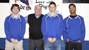 Johnny Tribbett, left, Coach Jim Tribbett, Matt Rose and Tonee Hill were conference award winners for the Raiders’ boys team. -- SUBMITTED/MARY DILDAY 