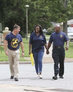 J.P. King Assistant Principal Ricky Wright, Cassandra Bell and her husband Superintendent Willie J. Bell head over from Berkley Court to The Children’s Center to meet some future students. -- Cain Madden | Tidewater News