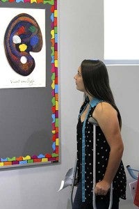 Rachel Brock, 13, altered her schedule to fit in art, and during the open house, she explores the new art room at the Georgie D. Tyler Middle School. -- Cain Madden | TIDEWATER NEWS