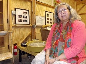 Lynette Allston, chief of the Nottoway Indian Tribe in Virginia, creates pottery of her own design at her potter’s wheel. She’ll spend a few hours at a time in a craft she calls “organic.” -- STEPHEN H. COWLES | TIDEWATER NEWS