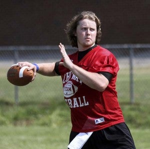 Quarterback Dain McFarland looks to throw the ball during practice. -- Cain Madden | Tidewater News
