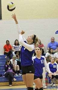 Tipping one over is Kelsey Searcy of the Windsor High Lady Dukes volleyball team. They won 3-0 on Monday against the Surry High Lady Cougars. FRANK DAVIS | TIDEWATER NEWS