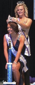 Kirstyn Paige Andrews, 20, kneels to receive the crown as the 2015 Miss Franklin-Southampton Fair Queen from Calli Joyner, last year's winner. For more pageant pictures, see pages B1-B2. -- Stephen H.Cowles | The Tidewater News