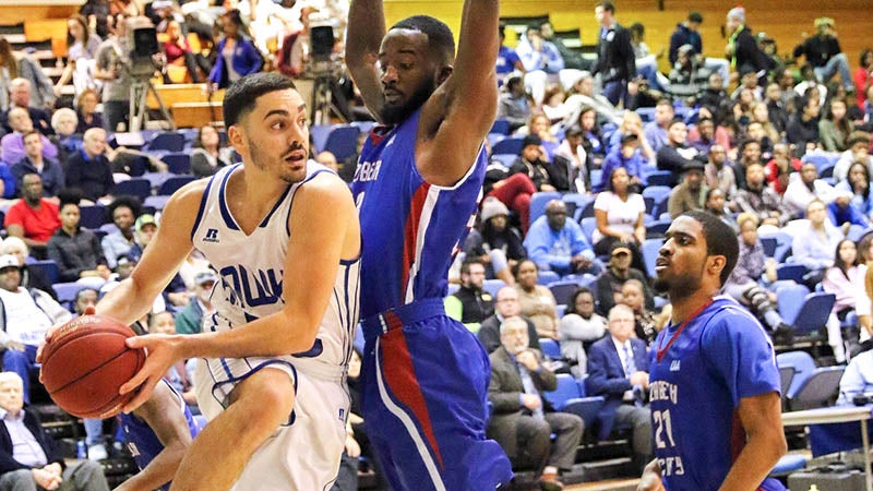 Carlos Arroyo on a drive loos to pass off the ball. -- Frank A. Davis | Tidewater News